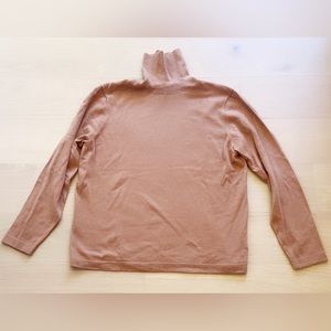Gorgeous soft weight tan turtleneck.